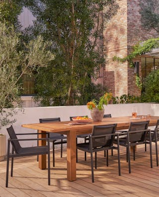 The Avalon Mixed Seating Bundle, styled in a sunny poolside patio