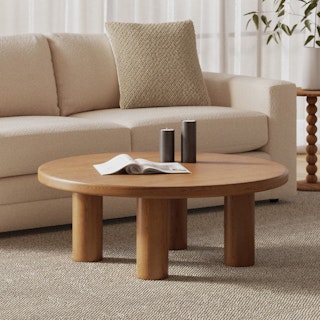 The Adel 42" Round Coffee Table in Smoked Oak