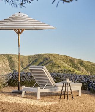 Eleya Lounger and Halden Side table with, Maria Umbrella.