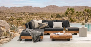 Lubek Corner Sectional Set in Slate Gray, styled with a desert backdrop
