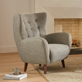 Mid-century modern gray upholstered accent chair.