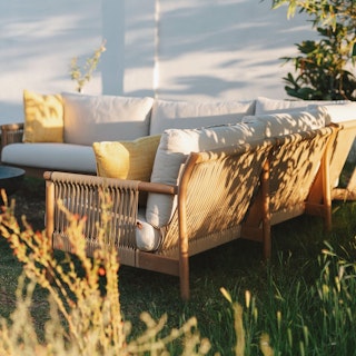 Styled image of the Rosa 110" Outdoor Corner Sectional in Dravite Ivory . Photo by @nataliecarrasco_