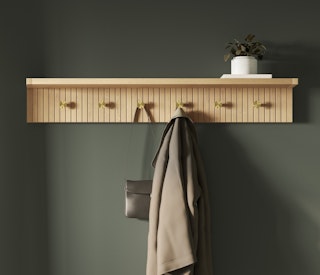 Kouva Shelf and Coat Rack in Natural Oak styled with a plant, handbag and a shirt hanging from the hook