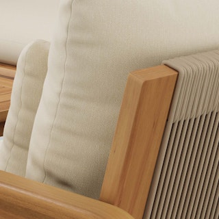 Detail view showcasing woven rope backrest on Laholm 36.5" Outdoor Lounge Chair in Dravite Ivory