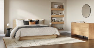 A bright airy japandi themed bedroom showing The Light Touch curated room design