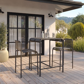Sunny patio styled with the Sarek Outdoor Bar Table and Counter Chairs in Taupe